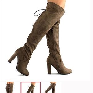 Soft, lace up suede taupe boots.